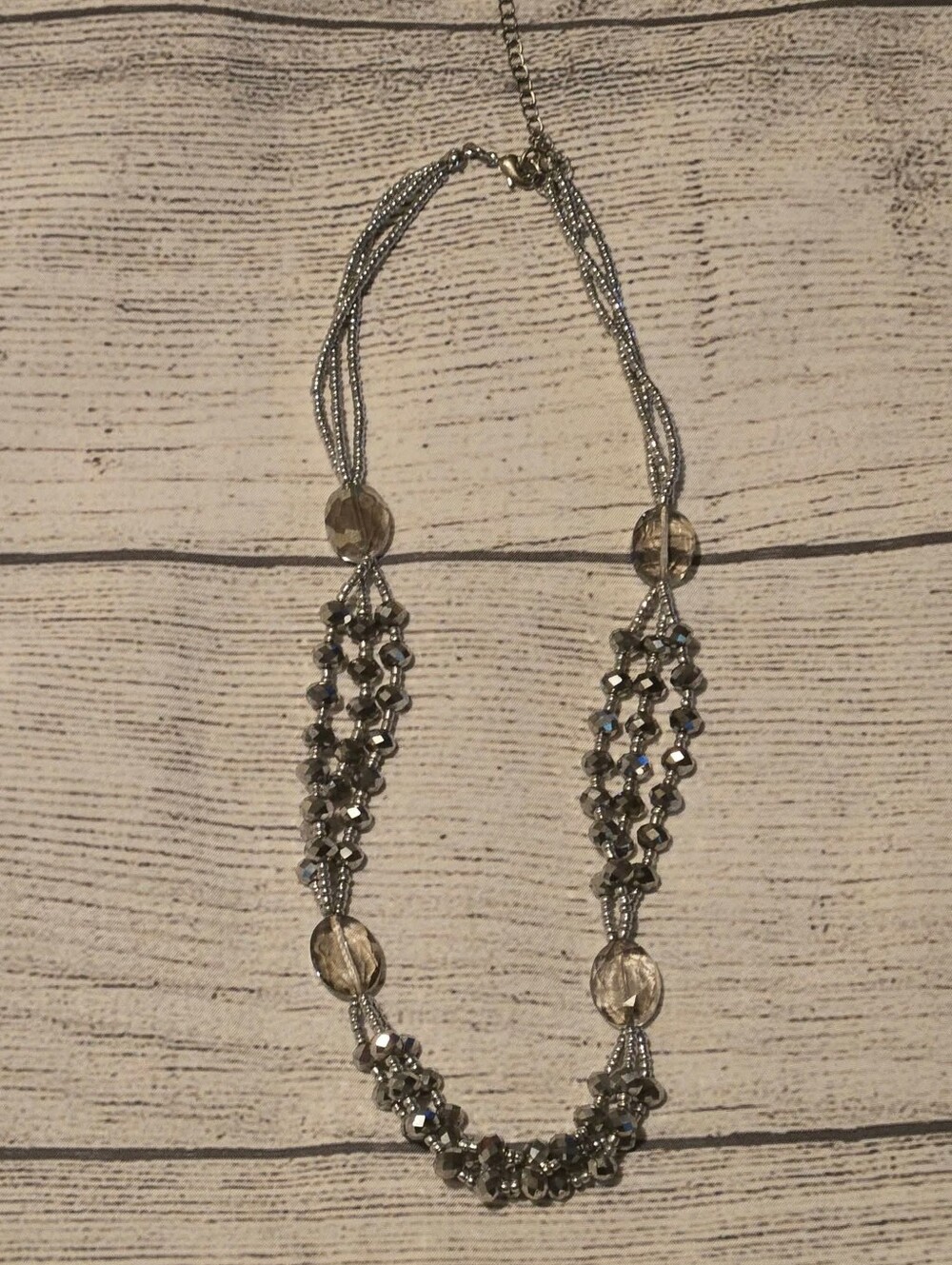 Gray multi strand beaded necklace